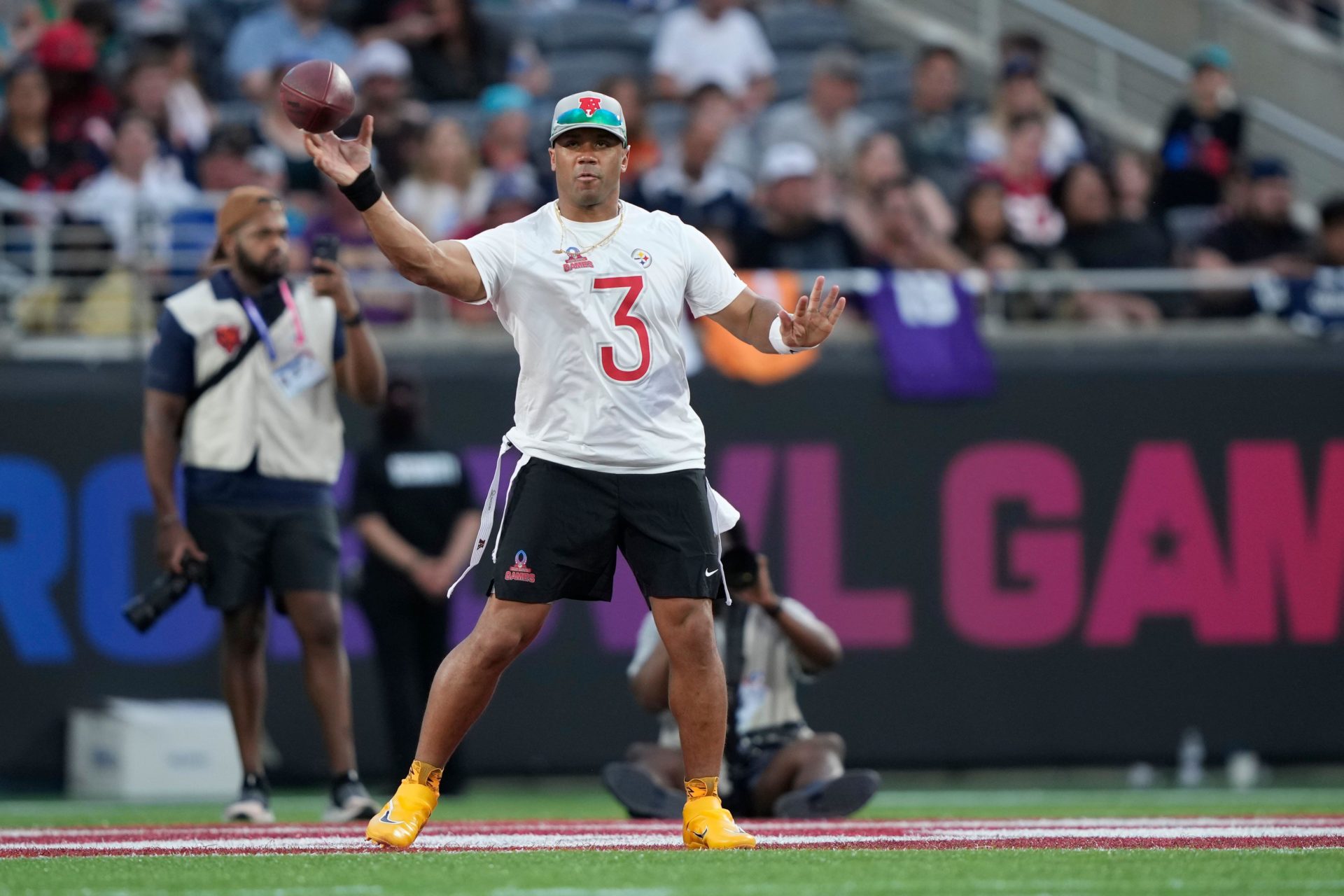 AFC quarterback Russell Wilson (3), of the Pittsburgh Steelers, passes during the flag football event at the NFL Pro Bowl Games on Sunday, February 2, 2025, in Orlando, Fla. (Doug Benc/AP Images for NFL)