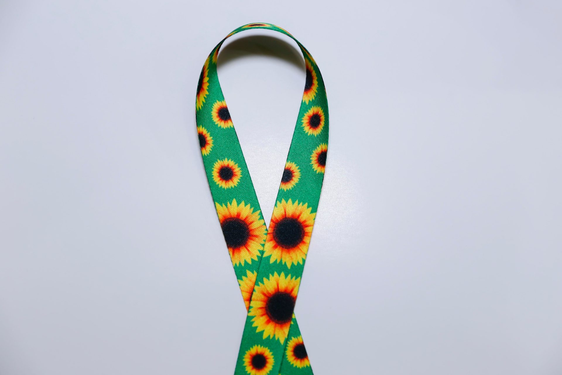 Sunflower lanyard - a symbol of awareness and support for people with autism and hidden disabilities. Image: Alamy