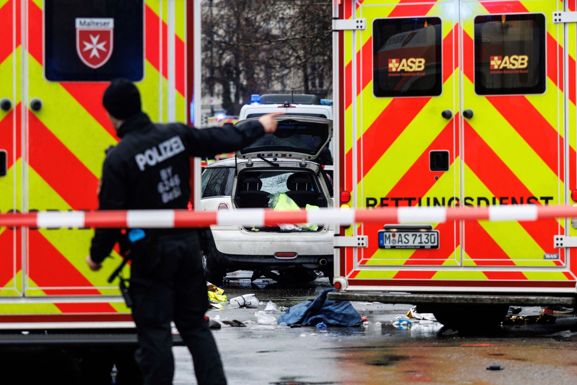 Emergency services attend the scene of an accident after a driver hit a group of people in Munich, Germany, Thursday Feb. 13, 2025. (Matthias Balk/dpa via AP)