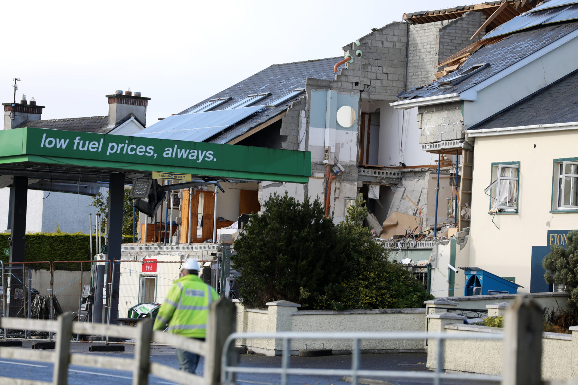 10/10/2022 Boyle construction workers at the devastating scene at the Apple Green Garage (Petrol Station) and damaged apartments where Ten people died in the Explosion tragedy in Creeslough, County Donegal. Photo: Sasko Lazarov/RollingNews.ie