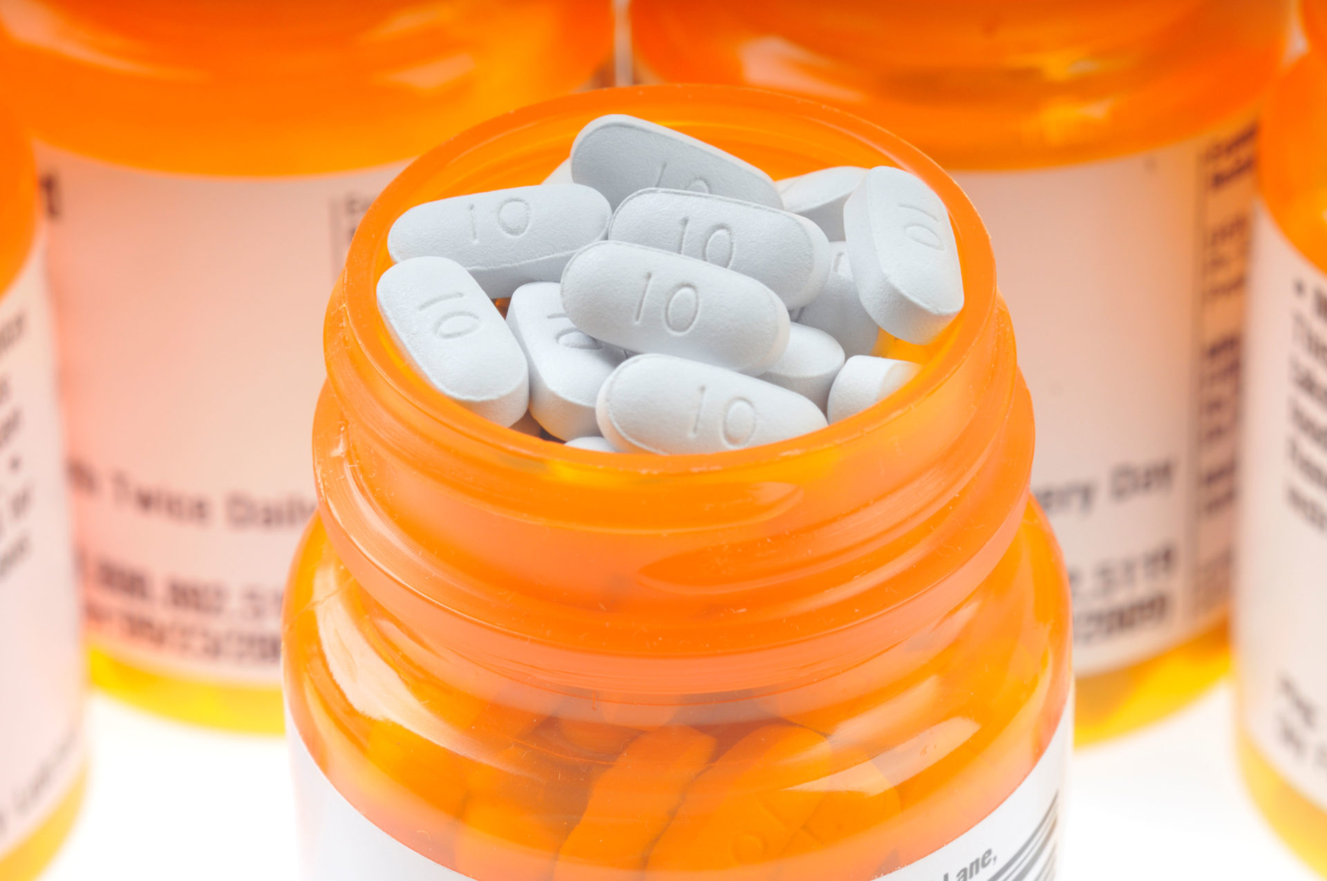 Open prescription bottle of tablets. Image: Alamy