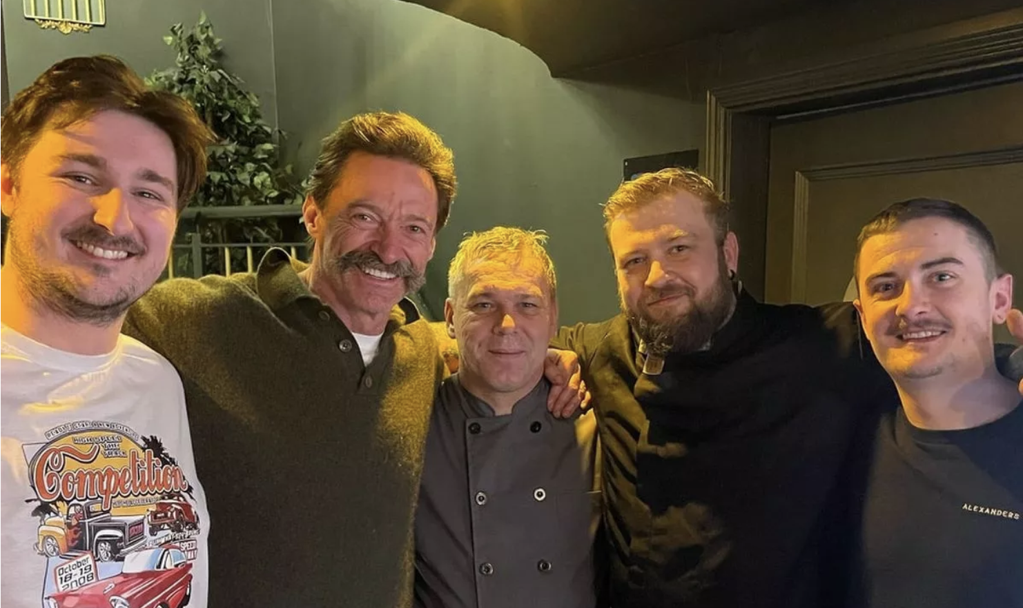 Hugh jackman with four men in Northen Ireland