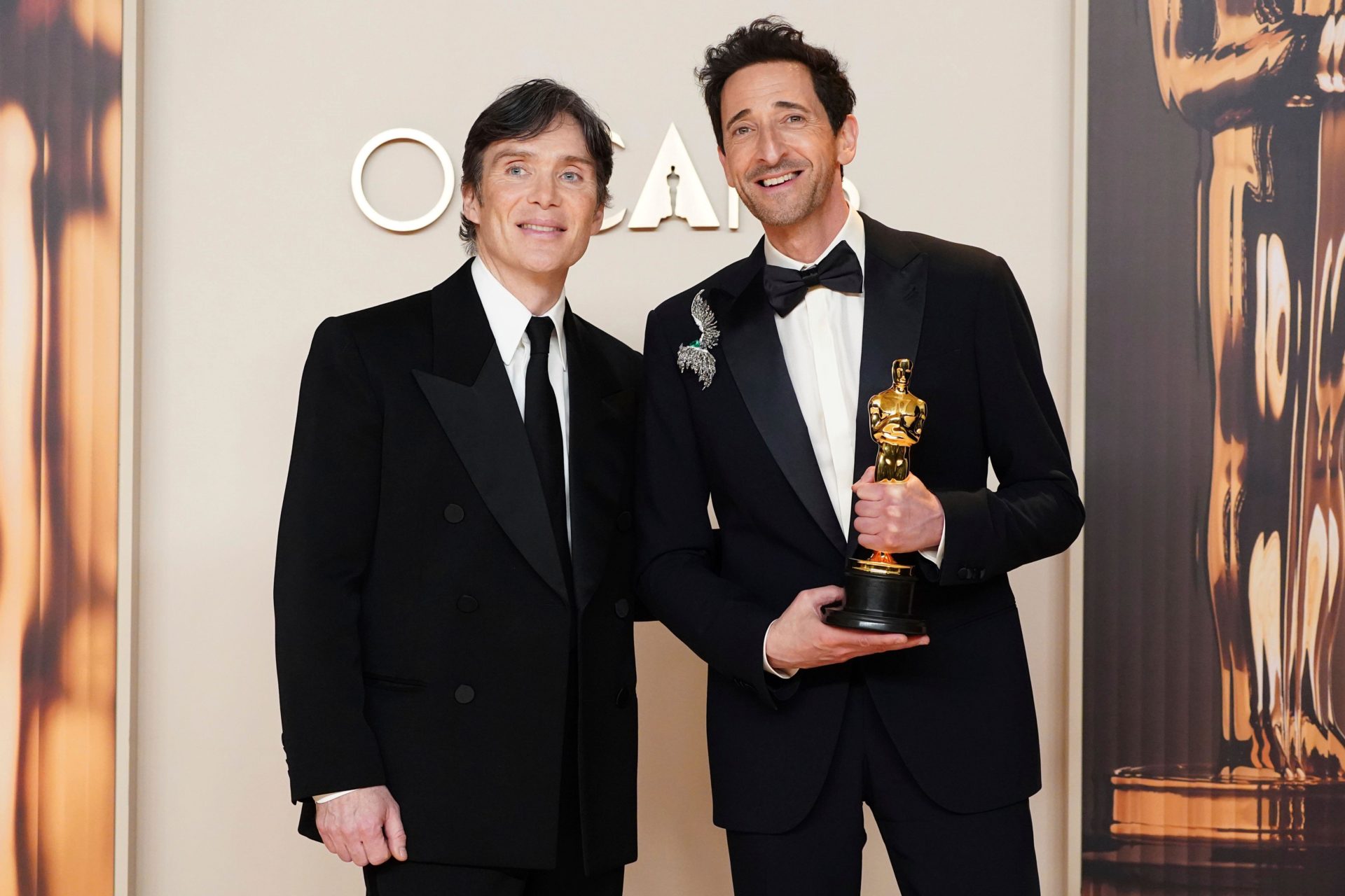 Cillian Murphy, left, and Adrien Brody, winner of the award for best performance by an actor in a leading role for "The Brutalist," pose in the press room at the Oscars on Sunday, March 2, 2025, at the Dolby Theatre in Los Angeles. 