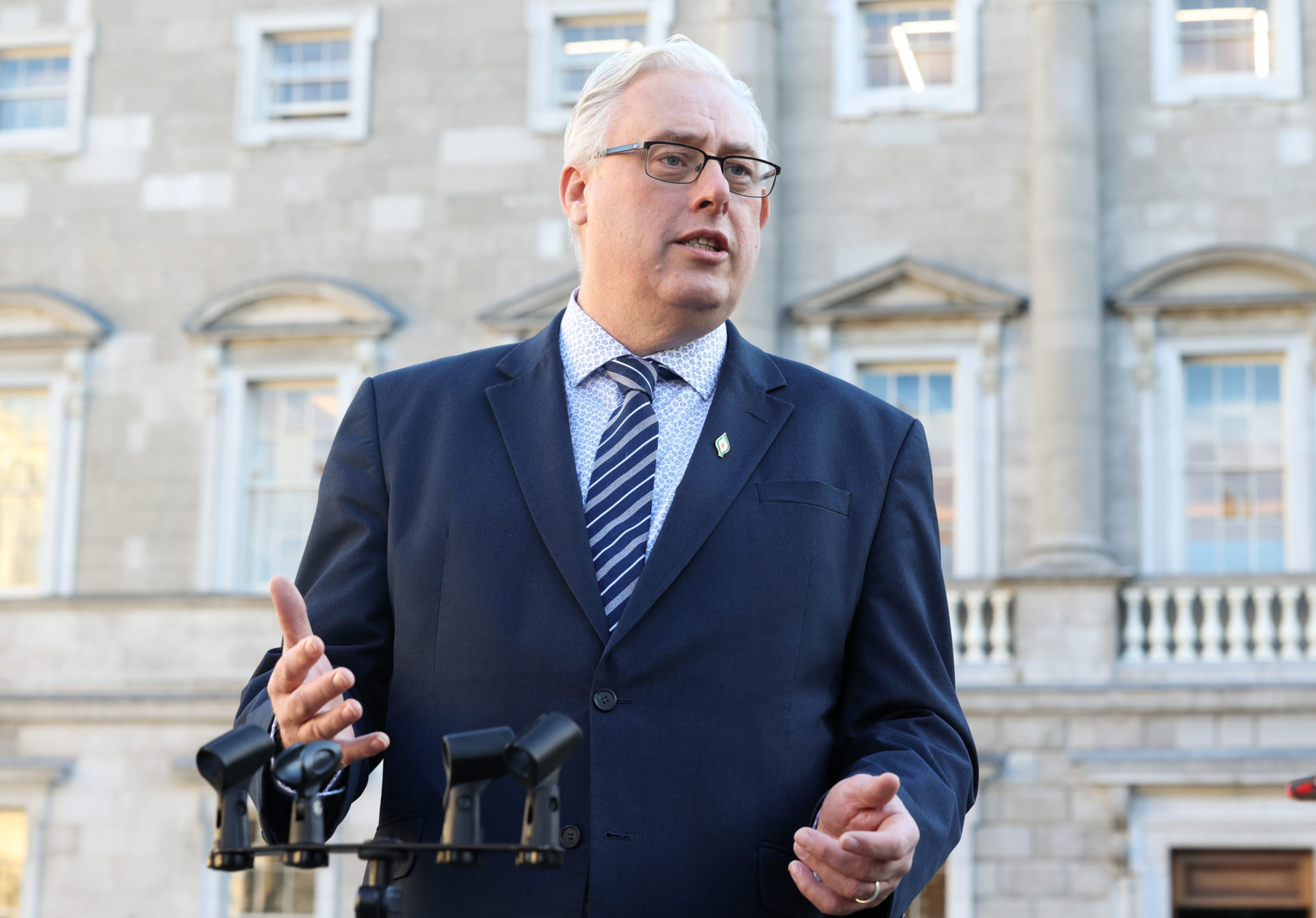 Sinn Féin TD Thomas Gould speaking to media on the Plinth outside Leinster House