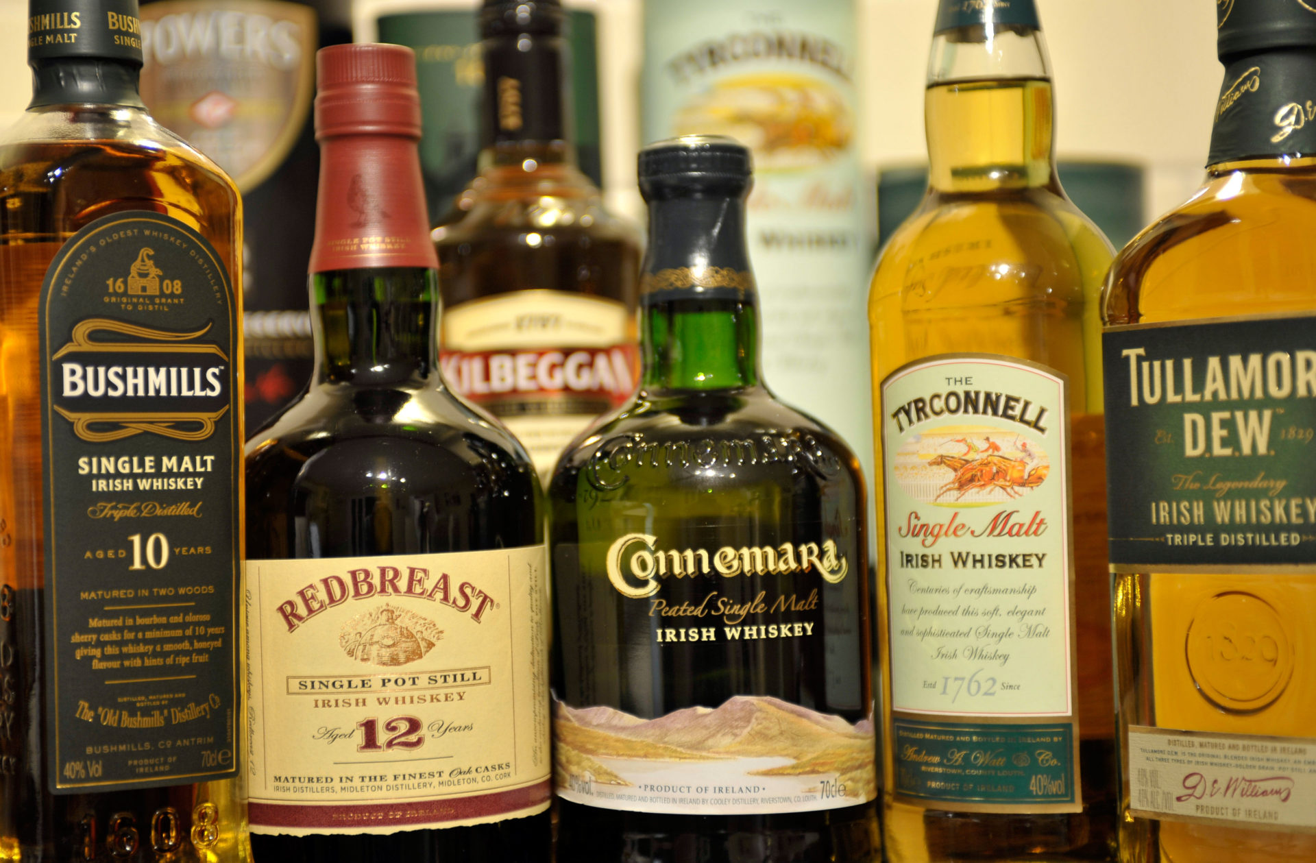 Bottles of Irish whiskey. From left, Bushmills, Redbrest, Kilbeggan, Connemara, Tyrconnell and Tullamore Dew.
