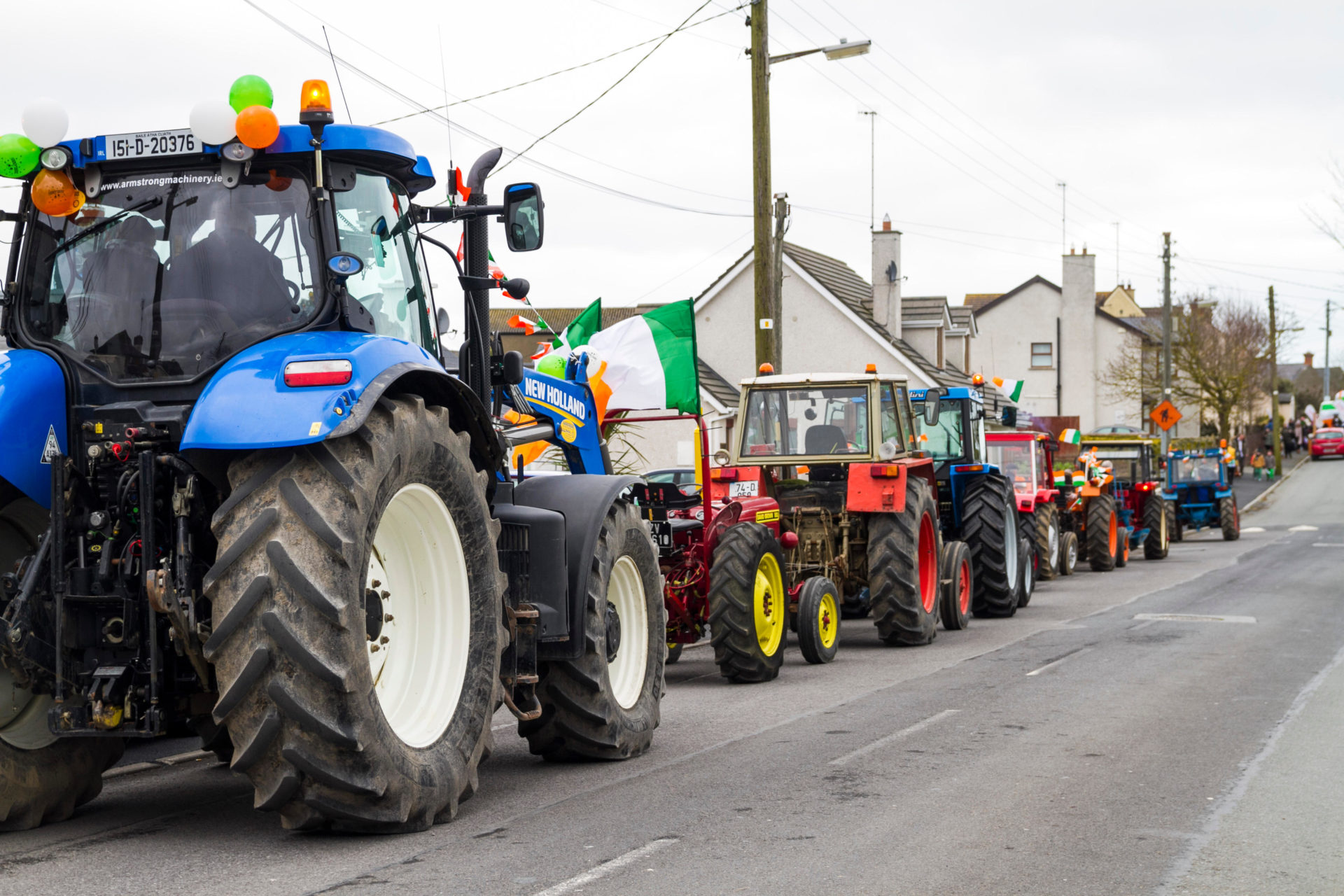 Vintage Tractors in a St. Patricks day parade, Rush. Co. Dublin Ireland st. patricks day old tractor. 