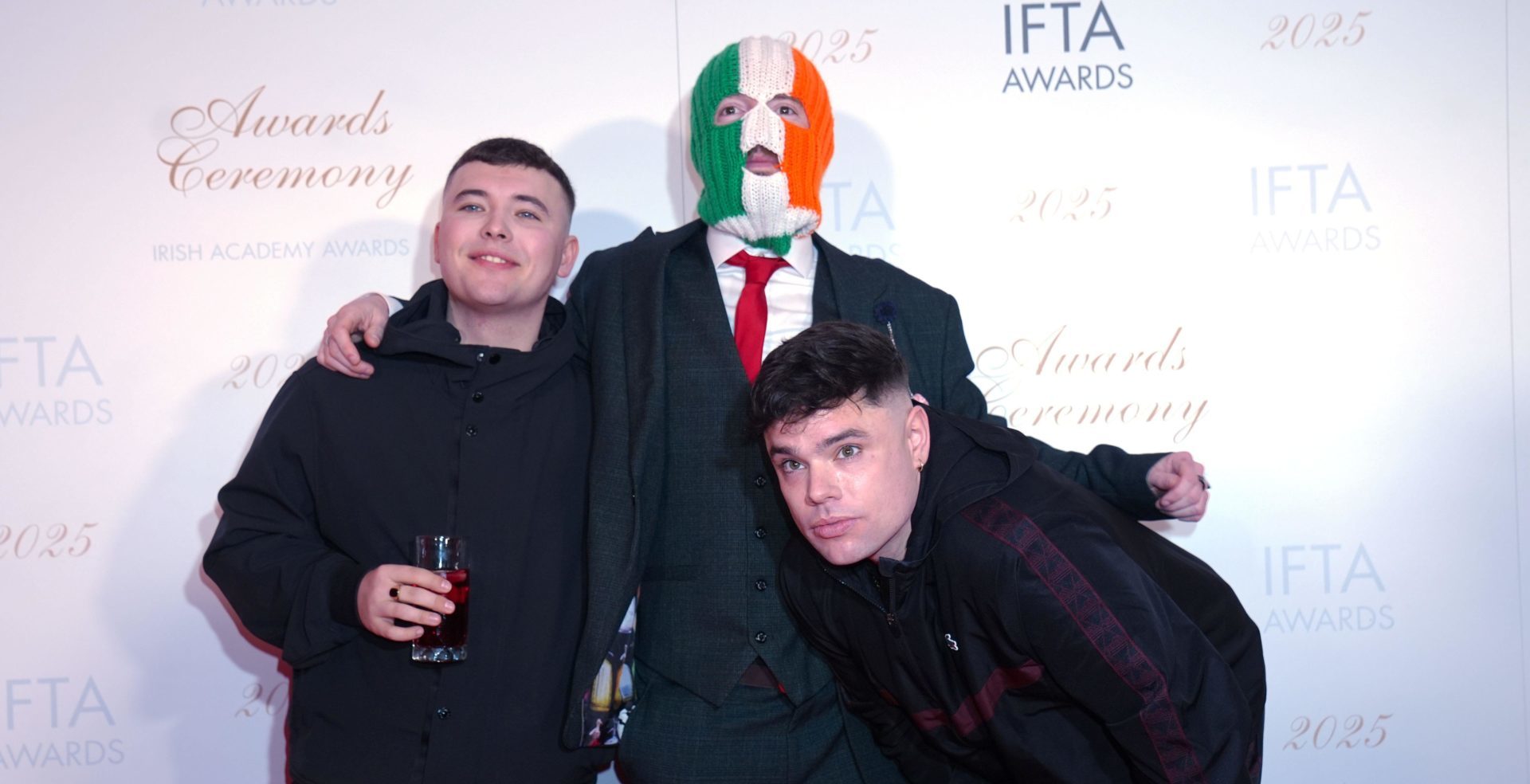 3B2M7NM File photo dated 14/02/25 of (left to right) members of Kneecap, Liam Og O Hannaigh (Mo Chara), JJ O'Dochartaigh (aDJ Provai) and Naoise O Caireallain (Moglai Bap) attending the Irish Film and Television Academy (IFTA) Awards Ceremony at the Dublin Royal Convention Centre. Conservative leader Kemi Badenoch has demanded the prosecution of rap trio Kneecap for allegedly calling for the death of Tory MPs. Video emerged of the group at a November 2023 gig appearing to show one member saying: "The only good Tory is a dead Tory. Kill your local MP." Issue date: Monday April 28, 2025.