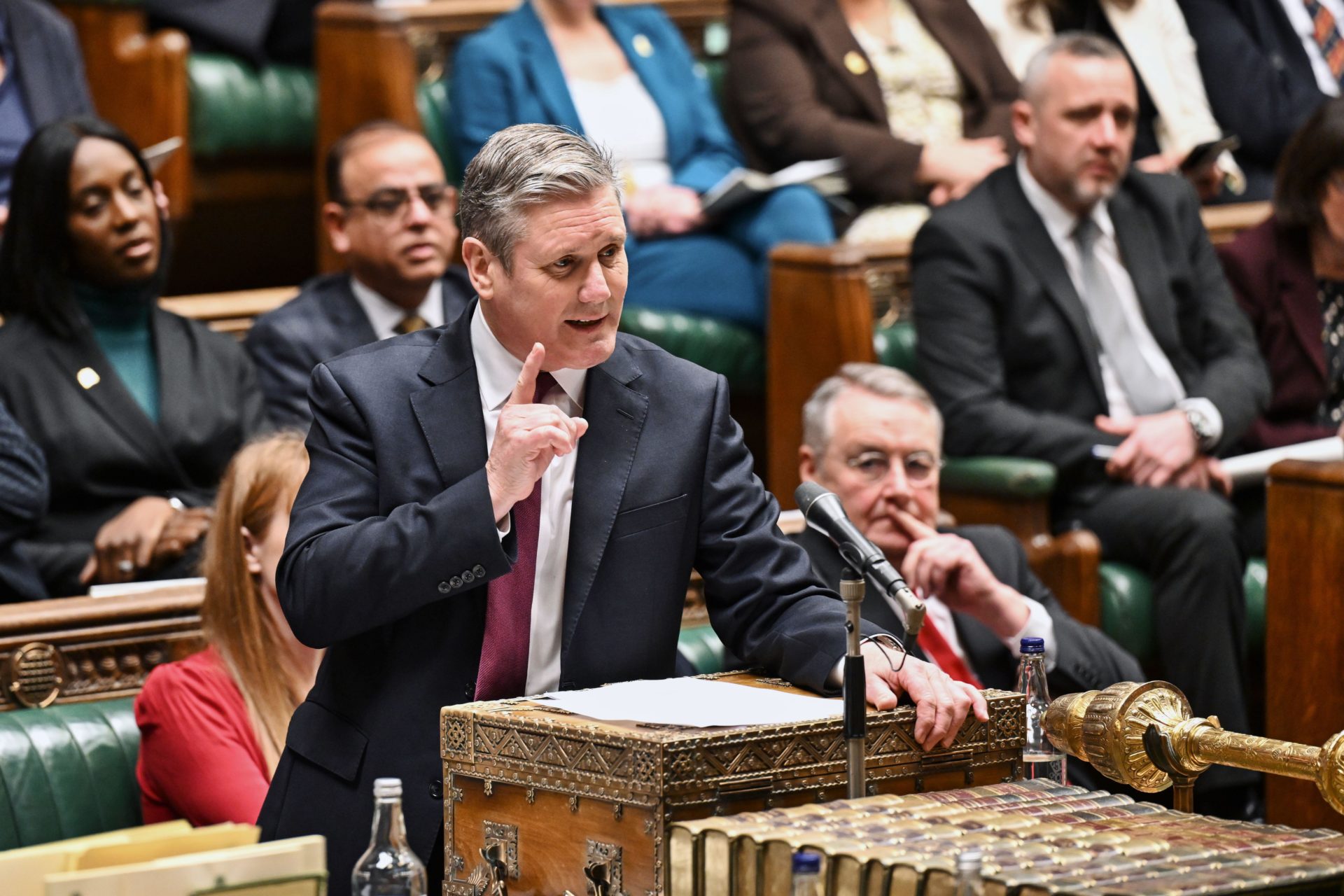 Keir Starmer talking and gesturing in the House of Commons, UK parliament in Westminster Palace.