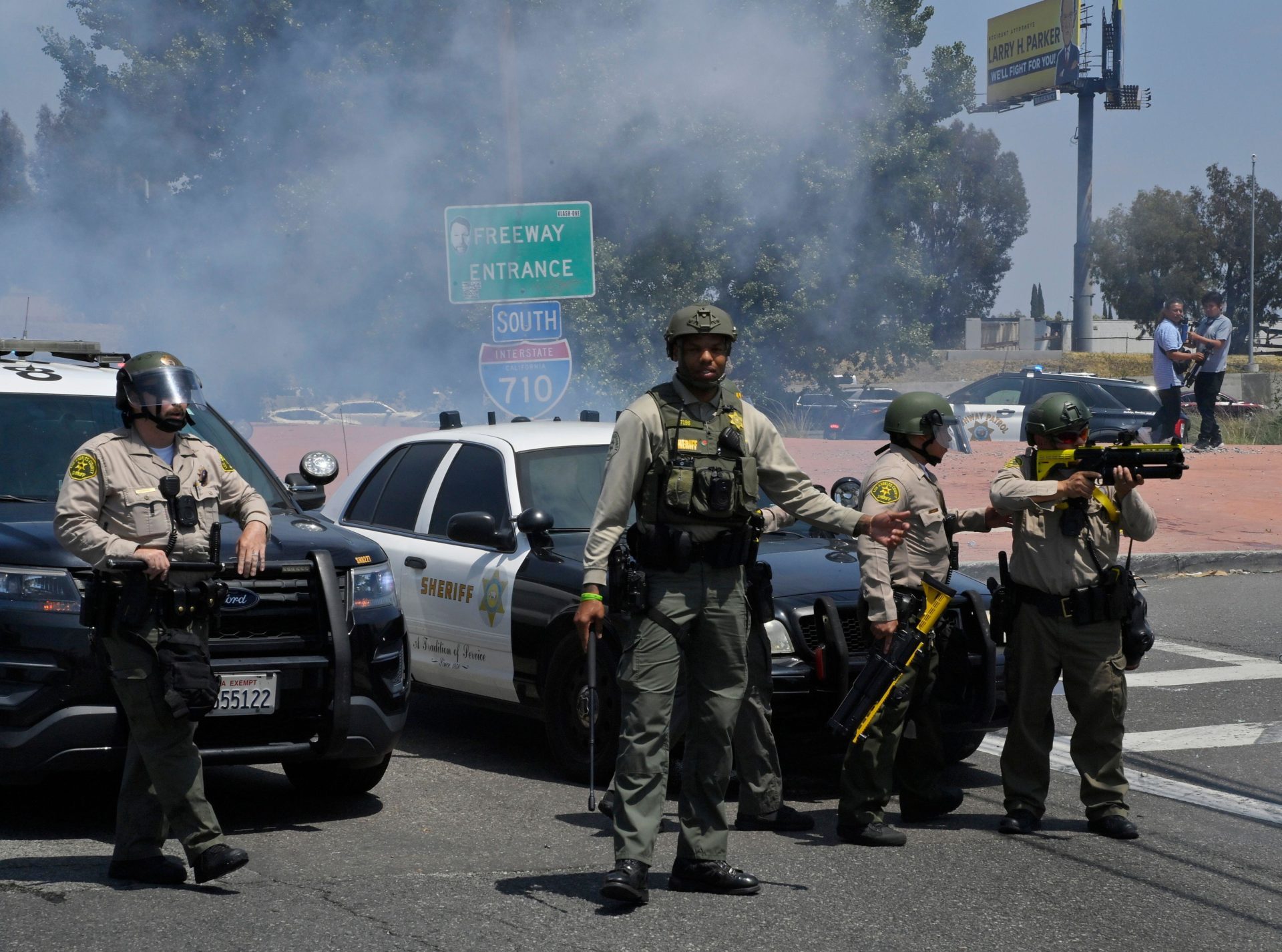 Protestors face off with California Highway Patrol officers during a protest against ICE and immigration raids in Paramount, California. June 7, 2025.