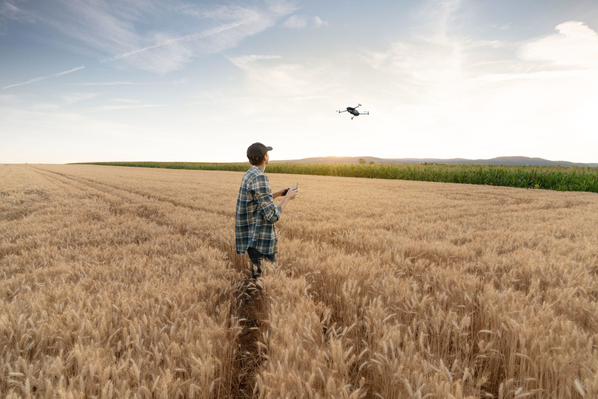 Farmer controls drone.