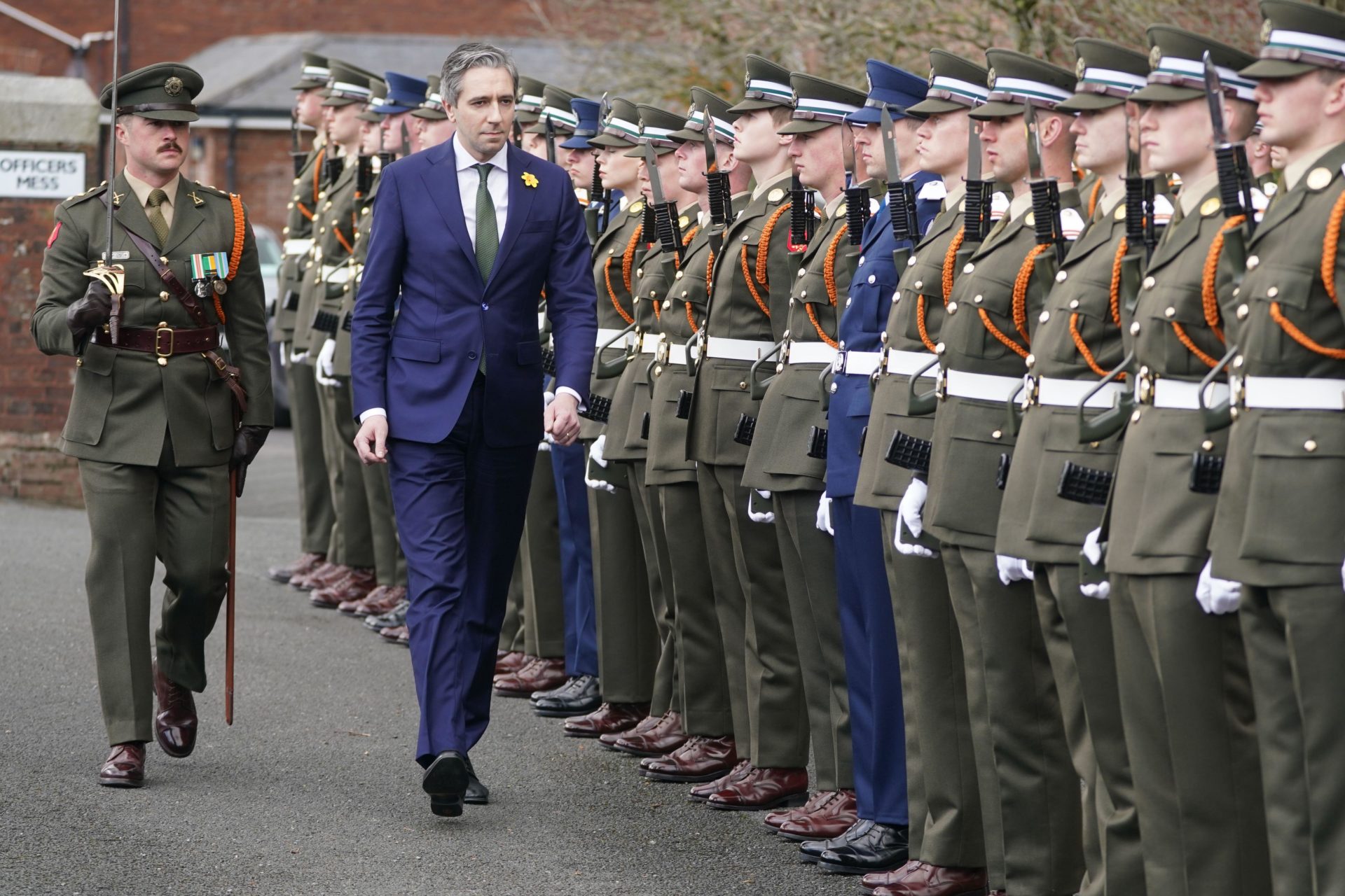 3A87G39 Tanaiste and Minister for Defence Simon Harris inspects a guard of honour as he attends the commissioning ceremony of the 100th cadet class & the 12th potential officers class, at the Defence Forces Training Centre, in Curragh, Co Kildare. Picture date: Friday March 28, 2025.
