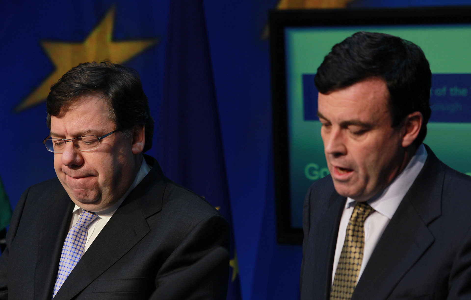 GCWJNY Taoiseach Brian Cowen (left) and Finance Minster Brian Lenihan (right) during a press conference in Government Buildings, Dublin, after the Irish Government tonight confirmed it will seek a bailout loan from the International Monetary Fund (IMF) and Europe.