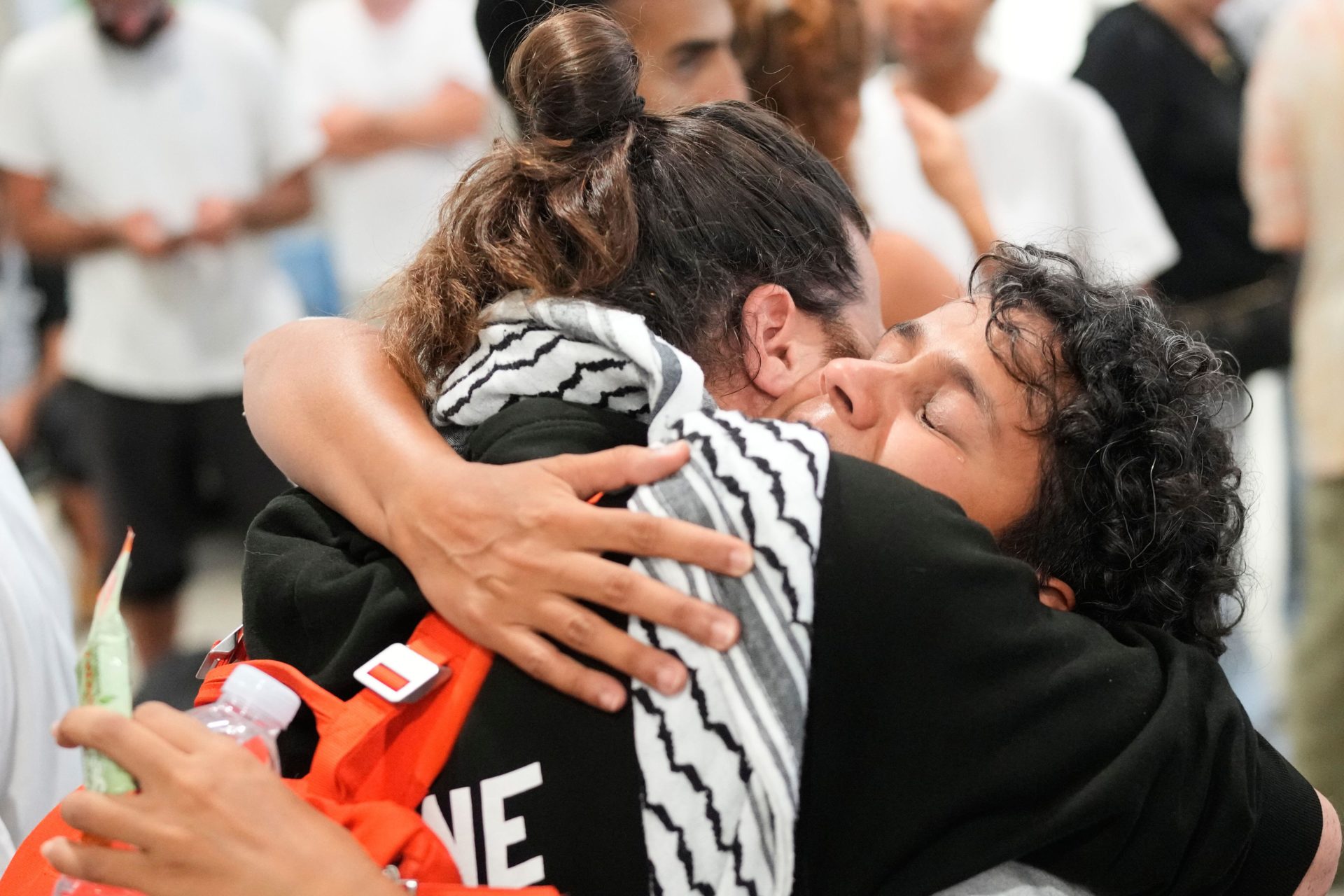 Activists arrive at the Eleftherios Venizelos International Airport in Athens, Monday, Oct. 6, 2025 after being deported from Israel for taking part in a Gaza-bound aid flotilla.