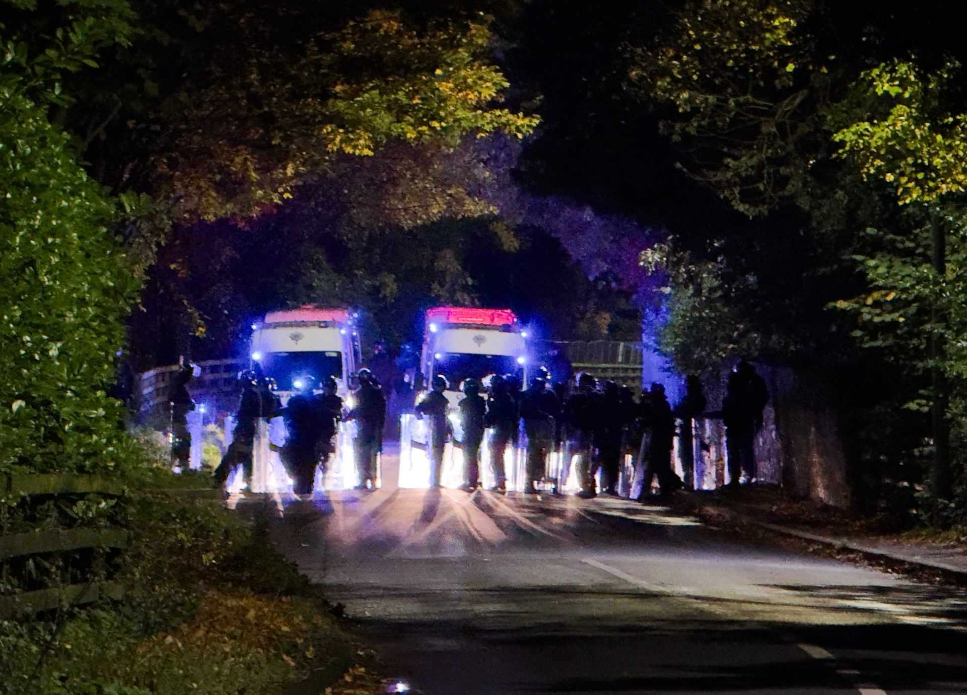 21/10/2025 Dublin, Ireland. The Garda Public Order blocks roads in the Citywest area, after violence broke out at the Citywest Hotel in west Dublin during a protest linked to the alleged sexual assault of a young girl in the area. The demonstration, promoted by anti-immigration and far-right groups, saw fireworks set off and chants of “Get them out” directed at the asylum seeker accommodation centre. Photograph: © RollingNews.ie