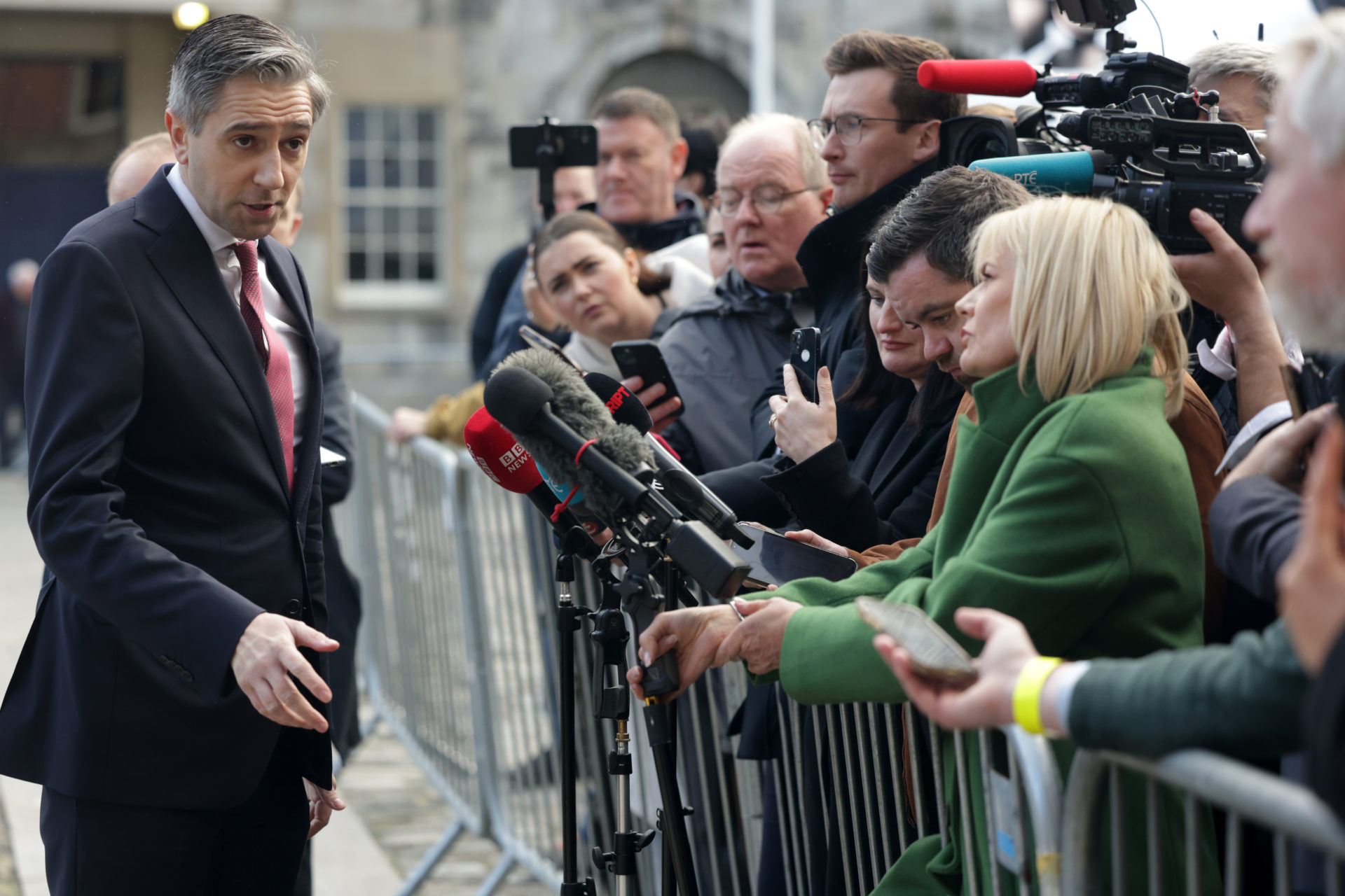 Fine Gael party leader Simon Harris speaking to the media and reporters while arriving at the presidential count at Dublin Castle.