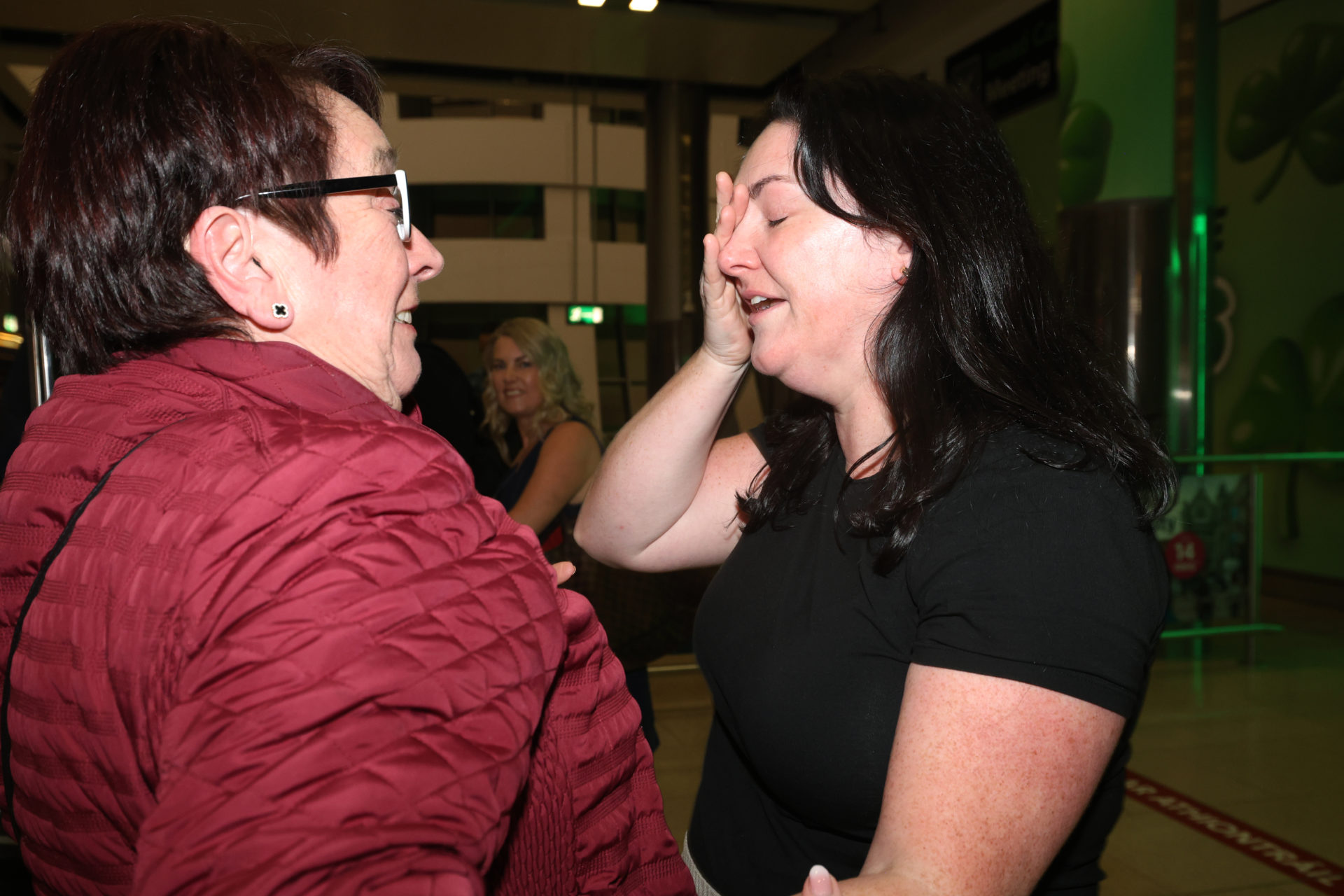 04/03/2026 Dublin Irish Leinster Ireland. Pictured Anna Gallagher as she meets her mum Patricia Gallagher from Donegal Town as she arrives back from Dubai in Dublin airport.. Emirates flight with 400 passengers took off from Dubai after Hundreds of flights have been cancelled on Monday as the US- Israel attack on Iran. continues to create widespread disruption in global air traveli. Photo: Leah Farrell/© RollingNews.ie