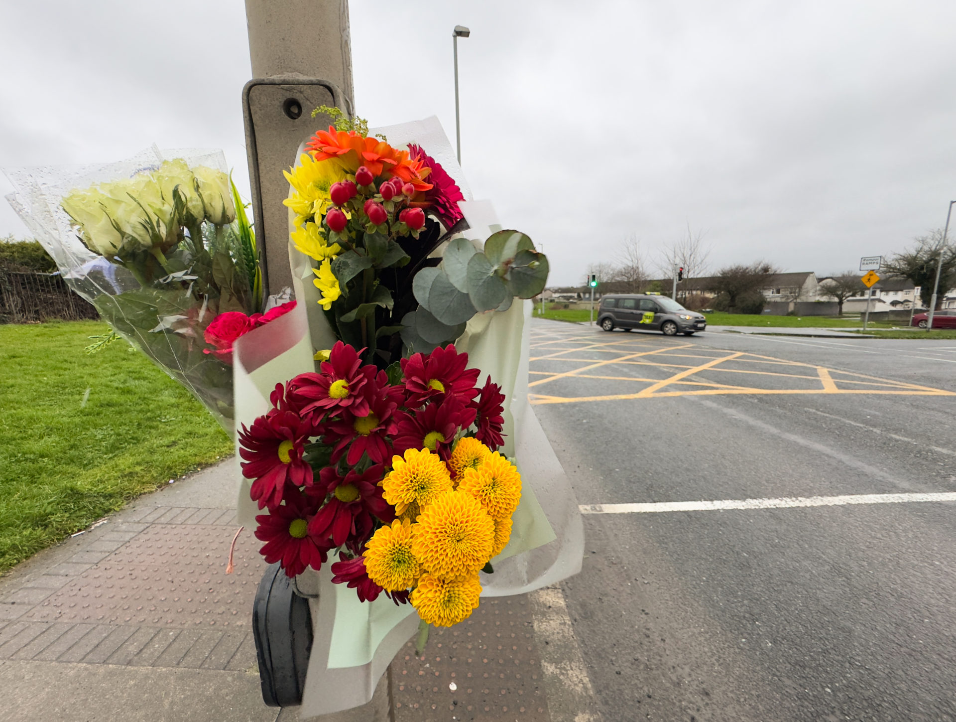26/01/2026 Dublin, Ireland. Flowers are left at the scene on Ratoath Road in Finglas, Dublin, where a 16-year-old girl Grace Lynch died after being struck by a scrambler motorbike on Sunday afternoon. The pedestrian was taken to Connolly Hospital in Blanchardstown, where she later died from her injuries. Gardaí have arrested a teenage boy under Section 4 of the Criminal Justice Act, 1984, in connection with the incident. Two other teenagers on the bike sustained non-life-threatening injuries. Gardaí are appealing for witnesses and any camera footage from the area between 2:10pm and 2:40pm. Photograph: Sasko Lazarov / © RollingNews.ie