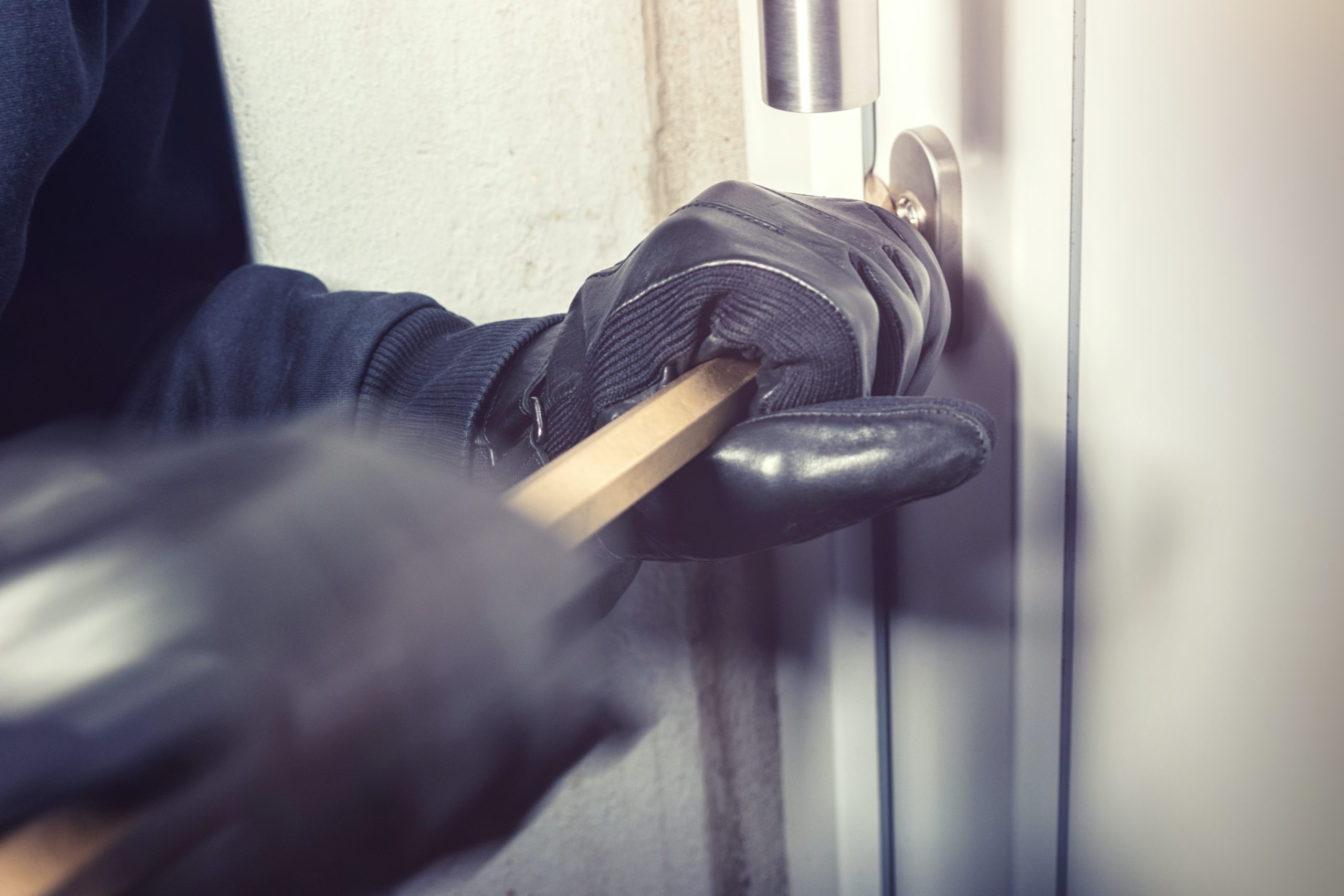 Carlow burglar escaping through window