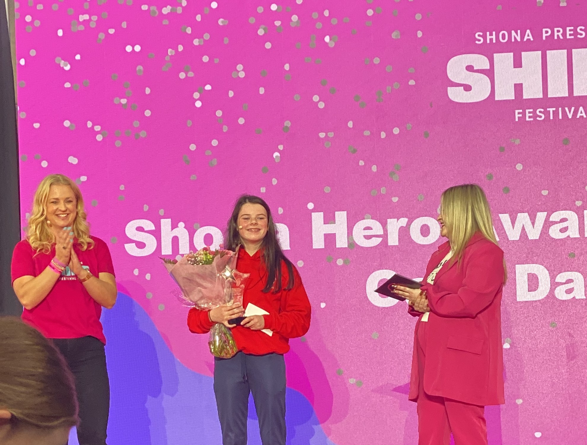 Cara Darmody receiving award